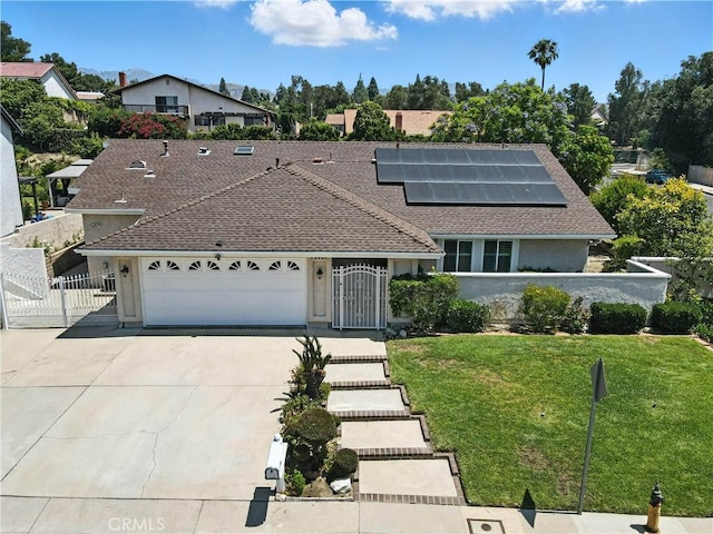 19401 Twin Hills Pl, Porter Ranch, CA 91326 - view of front facade with a garage, driveway, solar panels, roof with shingles, and stucco siding