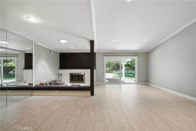 19401 Twin Hills Pl, Porter Ranch, CA 91326 - unfurnished living room with wood finished floors, a fireplace, crown molding, and recessed lighting