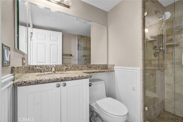 4144 Rainwood Ave, Yorba Linda, CA 92886 - bathroom with a stall shower, a wainscoted wall, vanity, and a decorative wall