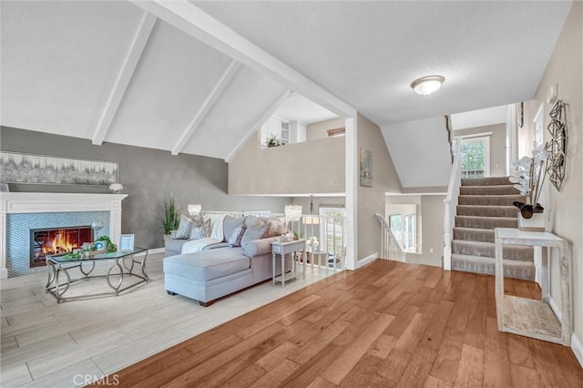 4144 Rainwood Ave, Yorba Linda, CA 92886 - living area featuring wood finished floors, a fireplace, and stairway