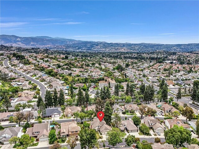 4144 Rainwood Ave, Yorba Linda, CA 92886 - aerial perspective of suburban area featuring a mountainous background