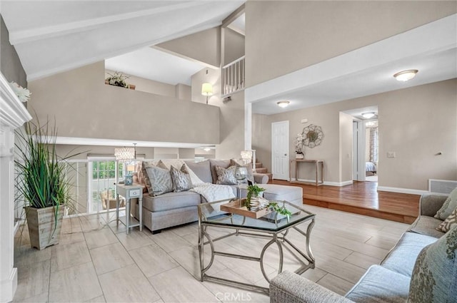 4144 Rainwood Ave, Yorba Linda, CA 92886 - living room featuring high vaulted ceiling, a fireplace, beam ceiling, and a chandelier