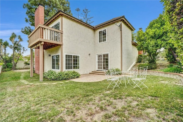 4144 Rainwood Ave, Yorba Linda, CA 92886 - back of house featuring stucco siding, a chimney, a balcony, and a patio