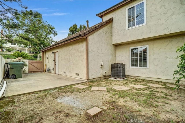 4144 Rainwood Ave, Yorba Linda, CA 92886 - view of side of property with a patio area, a gate, and stucco siding