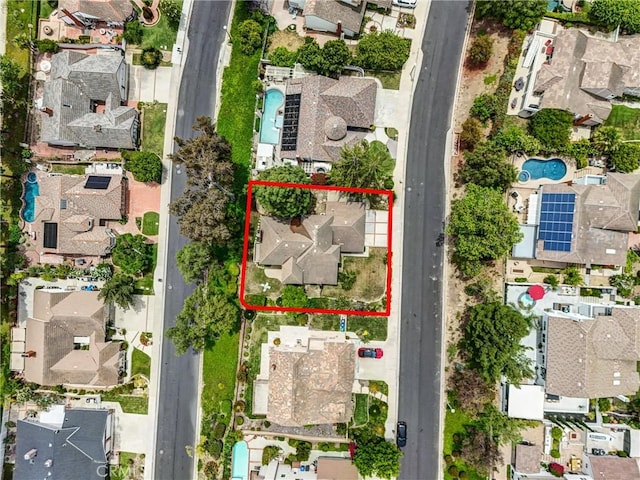 4144 Rainwood Ave, Yorba Linda, CA 92886 - aerial view of residential area with a pool area and property parcel outlined
