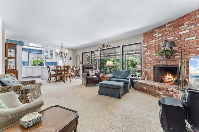 19302 Maynard Way N, Tustin, CA 92705 - living room with carpet flooring, a chandelier, and a fireplace