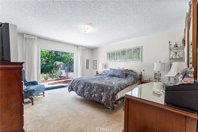 19302 Maynard Way N, Tustin, CA 92705 - bedroom featuring carpet flooring, access to outside, and a textured ceiling