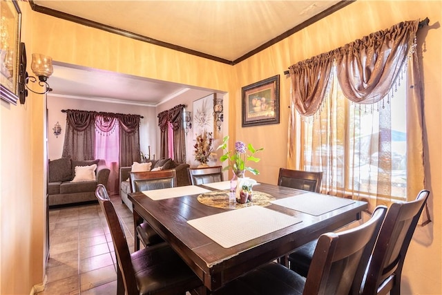 10752 Weigand Ave, Los Angeles, CA 90059 - tiled dining room featuring ornamental molding