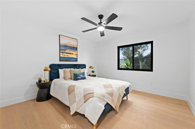 2959 Butler St, Oceanside, CA 92054 - bedroom featuring baseboards, light wood-type flooring, and ceiling fan