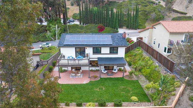 2959 Butler St, Oceanside, CA 92054 - rear view of property with a patio, solar panels, stucco siding, and a deck