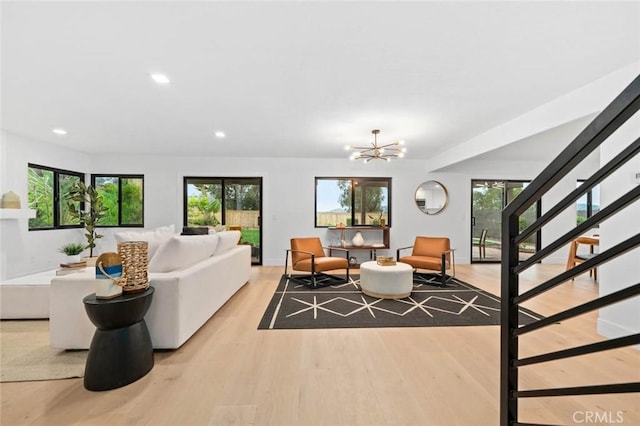 2959 Butler St, Oceanside, CA 92054 - living room with stairway, light wood-style flooring, healthy amount of natural light, a chandelier, and recessed lighting