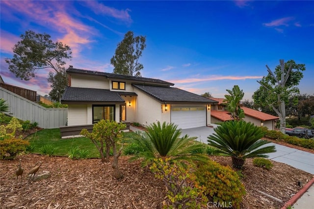 2959 Butler St, Oceanside, CA 92054 - view of front of home featuring driveway, an attached garage, and stucco siding