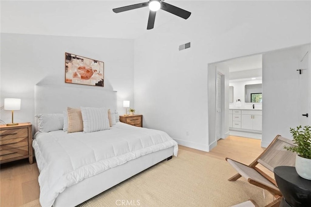 2959 Butler St, Oceanside, CA 92054 - bedroom with light wood-style flooring, vaulted ceiling, ensuite bathroom, ceiling fan, and baseboards