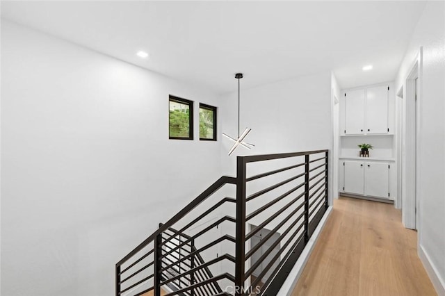 2959 Butler St, Oceanside, CA 92054 - hallway featuring an upstairs landing, light wood-style flooring, and recessed lighting