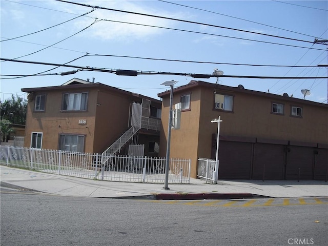 5659 Quinn St, Bell Gardens, CA 90201 - view of front facade featuring stucco siding