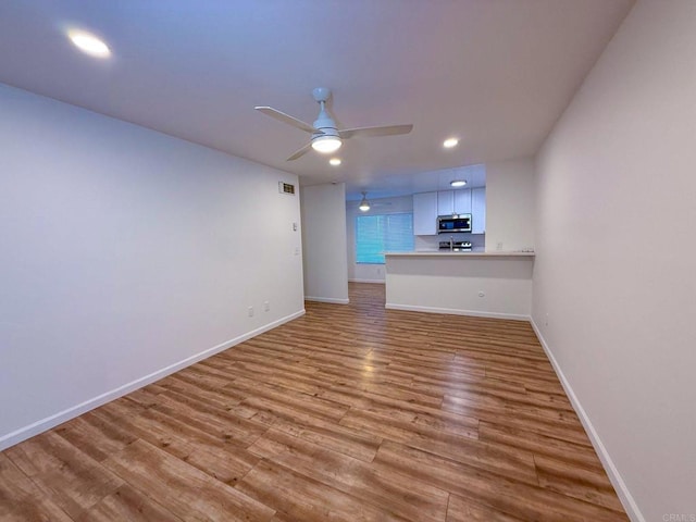 166 N 1st St Unit 18, El Cajon, CA 92021 - unfurnished living room with baseboards, light wood-style floors, a ceiling fan, and recessed lighting
