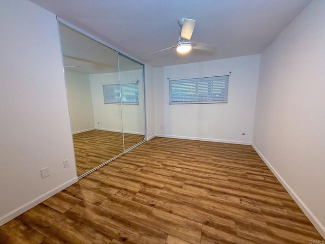 166 N 1st St Unit 18, El Cajon, CA 92021 - unfurnished bedroom featuring wood finished floors, baseboards, a closet, and a ceiling fan