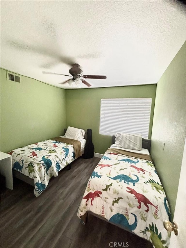 13955 Arthur Ave Unit 4, Paramount, CA 90723 - bedroom with a textured ceiling, wood finished floors, a ceiling fan, and baseboards