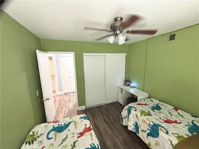13955 Arthur Ave Unit 4, Paramount, CA 90723 - bedroom with wood finished floors, a closet, ceiling fan, and baseboards