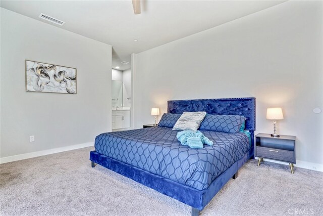 13176 Quinta Way, Desert Hot Springs, CA 92240 - bedroom featuring carpet flooring, baseboards, and ensuite bath