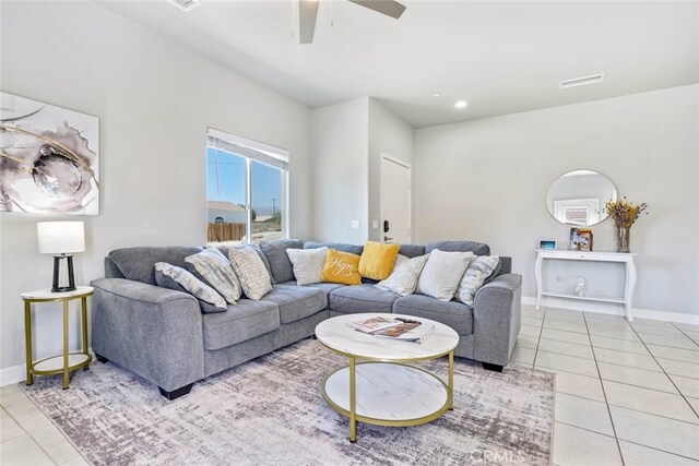 13176 Quinta Way, Desert Hot Springs, CA 92240 - living room featuring light tile patterned flooring, ceiling fan, and baseboards