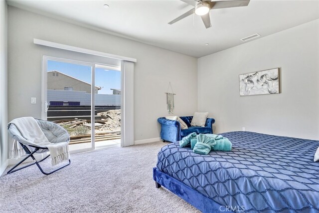13176 Quinta Way, Desert Hot Springs, CA 92240 - carpeted bedroom with access to outside, ceiling fan, and baseboards