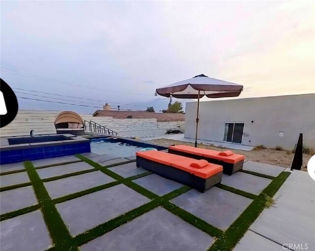 13176 Quinta Way, Desert Hot Springs, CA 92240 - view of patio / terrace featuring a pool with connected hot tub