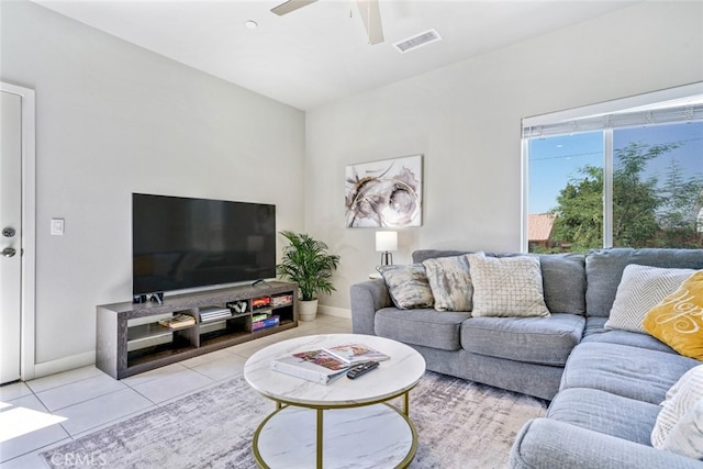 13176 Quinta Way, Desert Hot Springs, CA 92240 - tiled living area with a ceiling fan and baseboards