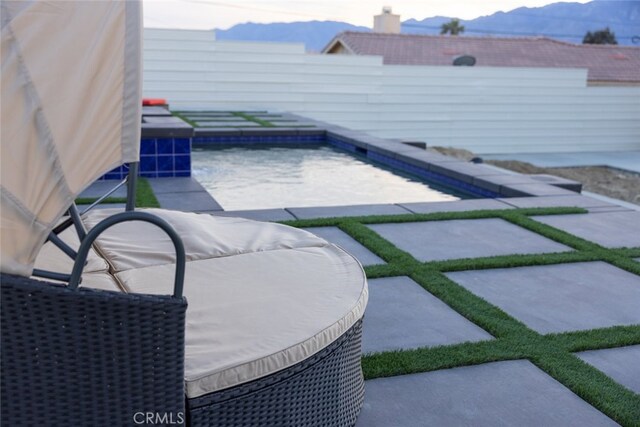 13176 Quinta Way, Desert Hot Springs, CA 92240 - fenced backyard featuring a mountain view and a patio