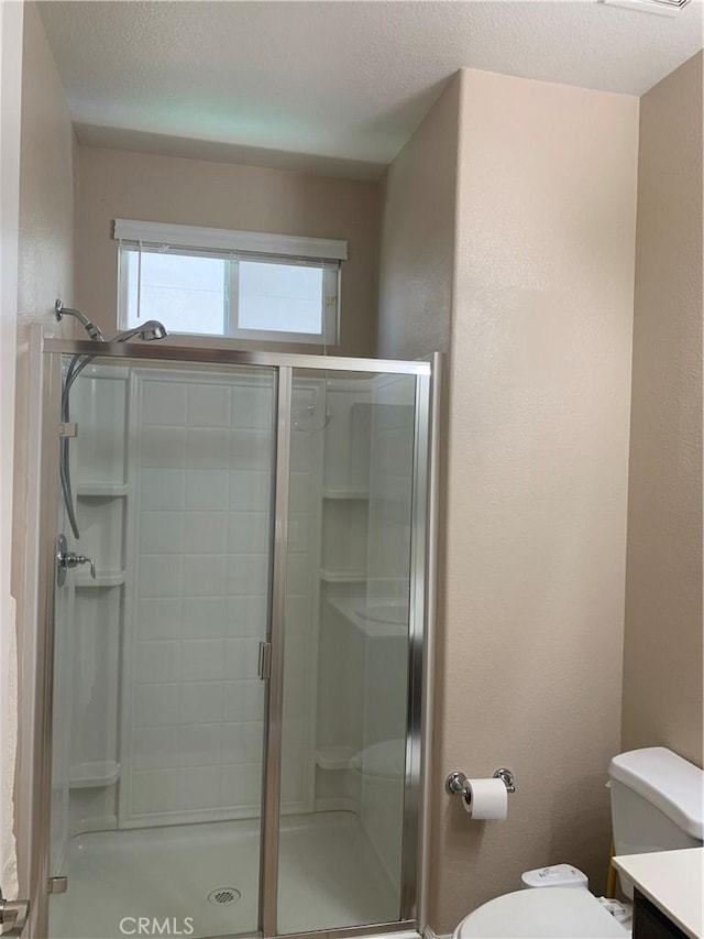 538 Burnt Ranch Way, Chico, CA 95973 - full bath featuring a stall shower, vanity, and a textured ceiling