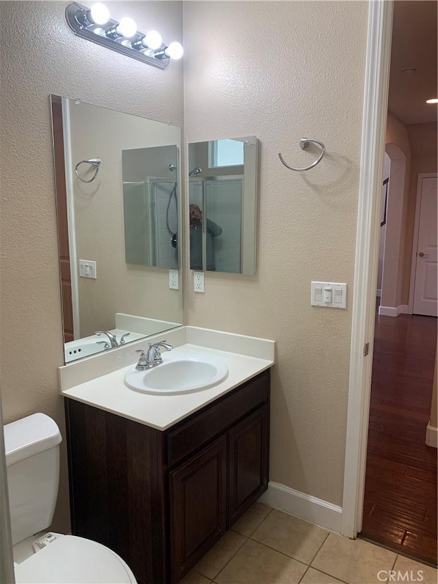 538 Burnt Ranch Way, Chico, CA 95973 - full bathroom featuring vanity, tile patterned floors, and a shower