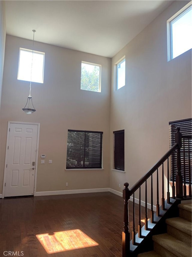 538 Burnt Ranch Way, Chico, CA 95973 - entryway featuring a towering ceiling, dark wood finished floors, and stairway