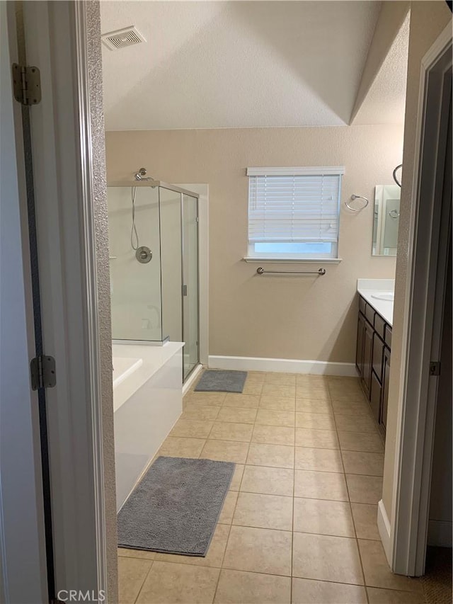 538 Burnt Ranch Way, Chico, CA 95973 - bathroom with a stall shower, vanity, tile patterned floors, and a bath
