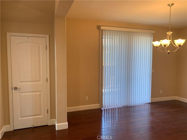 538 Burnt Ranch Way, Chico, CA 95973 - empty room featuring a chandelier and hardwood / wood-style floors