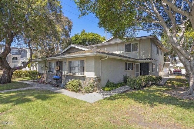 2692 Anchor Ave, Port Hueneme, CA 93041 - view of front of property with stairs, a front lawn, stone siding, and stucco siding