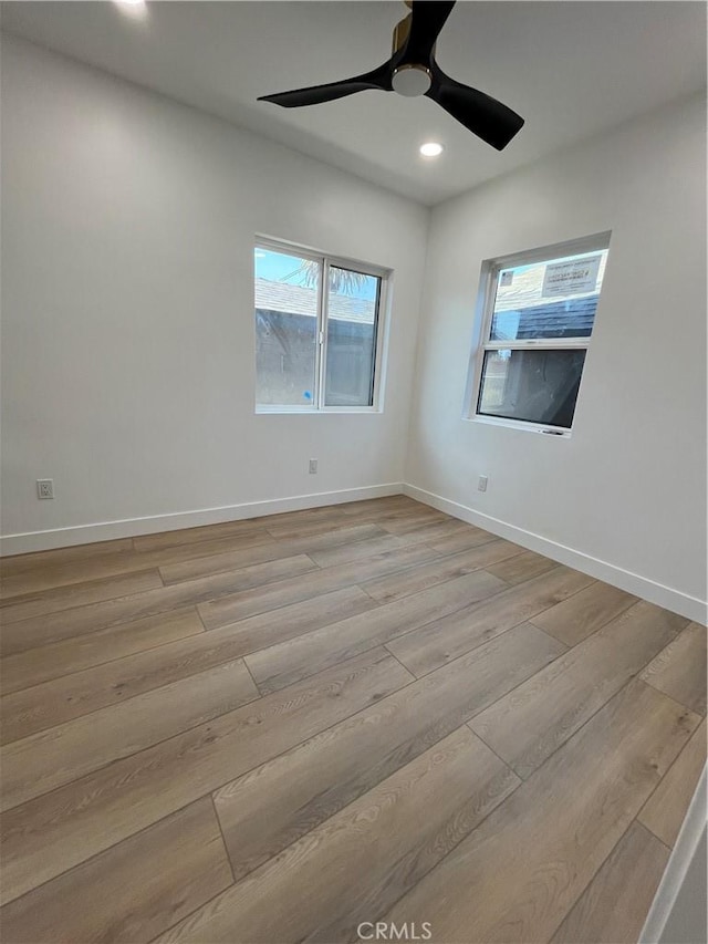 1082 Lewis Ave, Long Beach, CA 90813 - spare room featuring light wood finished floors, recessed lighting, ceiling fan, and baseboards