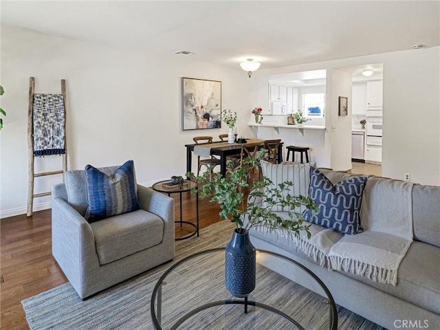 5924 S Pacific Coast Hwy Unit 22, Redondo Beach, CA 90277 - living area featuring wood finished floors and baseboards