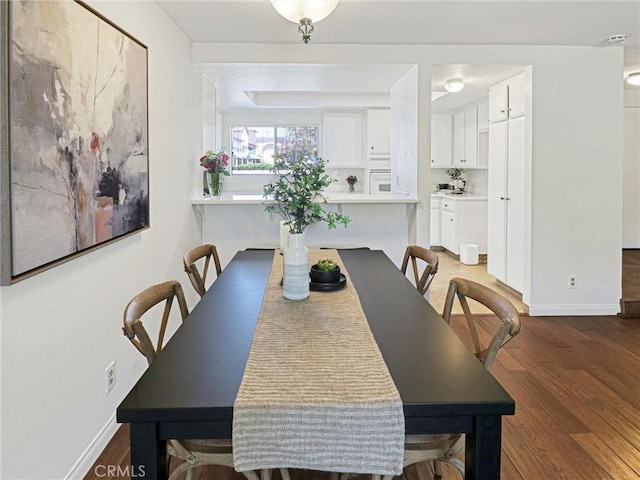 5924 S Pacific Coast Hwy Unit 22, Redondo Beach, CA 90277 - dining room featuring wood finished floors and baseboards
