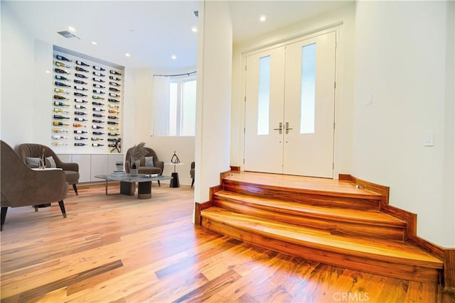 3964 Sumac Dr, Sherman Oaks, CA 91403 - foyer entrance featuring wood finished floors, stairway, recessed lighting, and baseboards