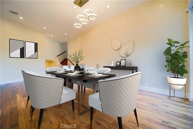3964 Sumac Dr, Sherman Oaks, CA 91403 - dining space with stairs, baseboards, recessed lighting, and wood finished floors