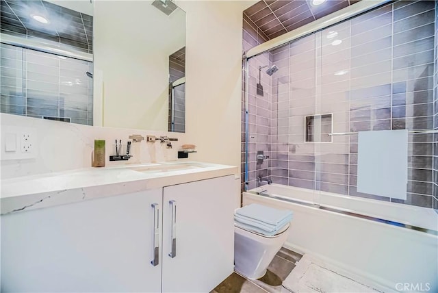 3964 Sumac Dr, Sherman Oaks, CA 91403 - full bathroom featuring toilet, vanity, combined bath / shower with glass door, and recessed lighting