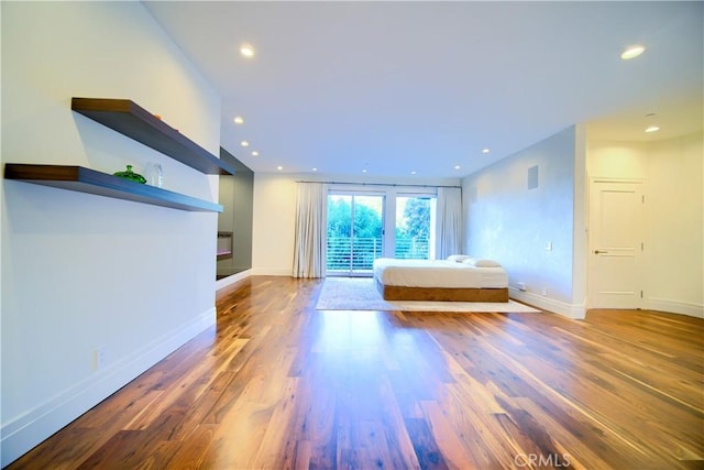 3964 Sumac Dr, Sherman Oaks, CA 91403 - bedroom featuring wood finished floors, access to exterior, recessed lighting, and baseboards