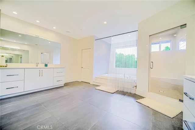 3964 Sumac Dr, Sherman Oaks, CA 91403 - bathroom featuring vanity, a bath, a stall shower, recessed lighting, and tile patterned floors
