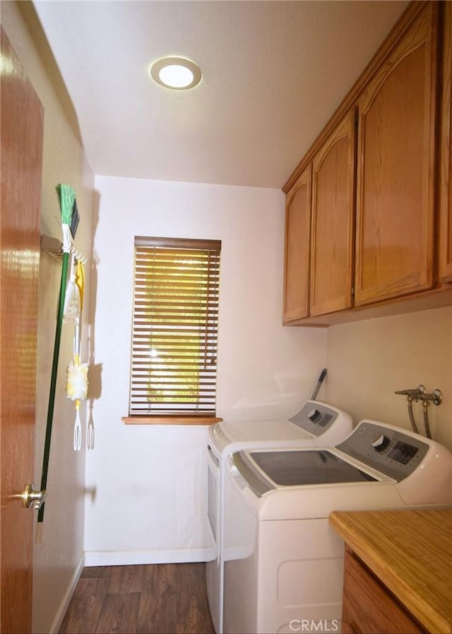 19180 Osceola Rd, Apple Valley, CA 92307 - washroom featuring cabinet space, washing machine and dryer, dark wood-style floors, and baseboards
