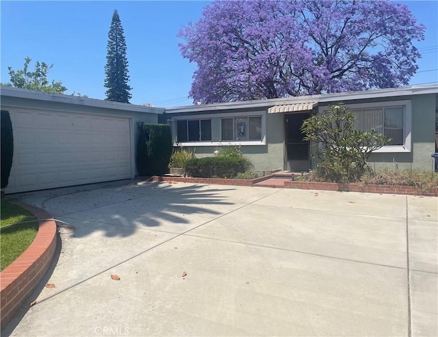 8308 Mango Way, Buena Park, CA 90620 - single story home featuring concrete driveway, stucco siding, and an attached garage