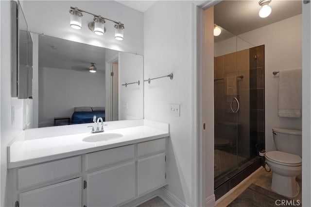 28215 Paseo El Siena Unit 46, Laguna Niguel, CA 92677 - bathroom featuring vanity, a stall shower, ensuite bathroom, and ceiling fan