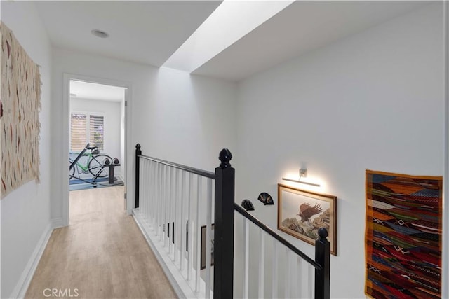 28215 Paseo El Siena Unit 46, Laguna Niguel, CA 92677 - corridor with an upstairs landing and light wood-type flooring
