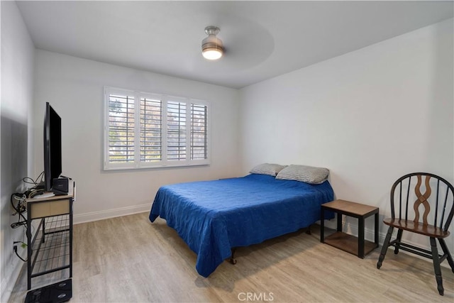 28215 Paseo El Siena Unit 46, Laguna Niguel, CA 92677 - bedroom featuring wood finished floors and baseboards
