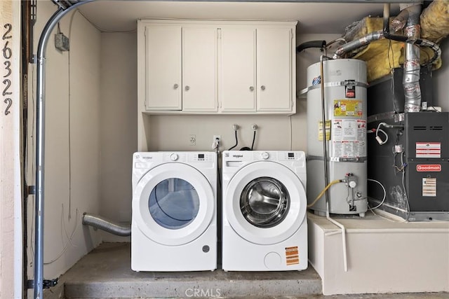 26322 W Bravo Ln, Calabasas, CA 91302 - washroom with secured water heater, cabinet space, washer and clothes dryer, and heating unit