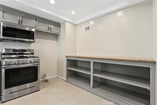 26322 W Bravo Ln, Calabasas, CA 91302 - kitchen featuring appliances with stainless steel finishes, gray cabinets, open shelves, baseboards, and recessed lighting